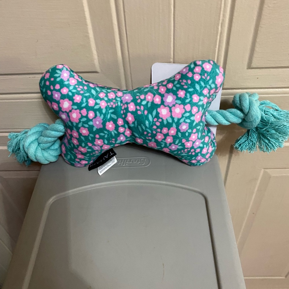 - Brand New Tahari Bone Dog Toy With Rope And Squeaker.